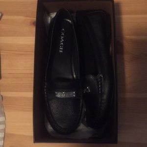 New black Coach loafers.